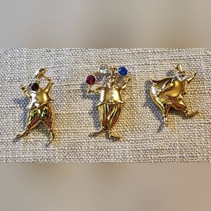 Vintage Monet Clown/Jester Pins. Gold-tone with rhinestones of various colors.
